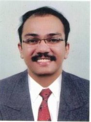 Shri. Tojin Thomas